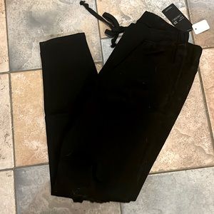 Black distressed denim joggers